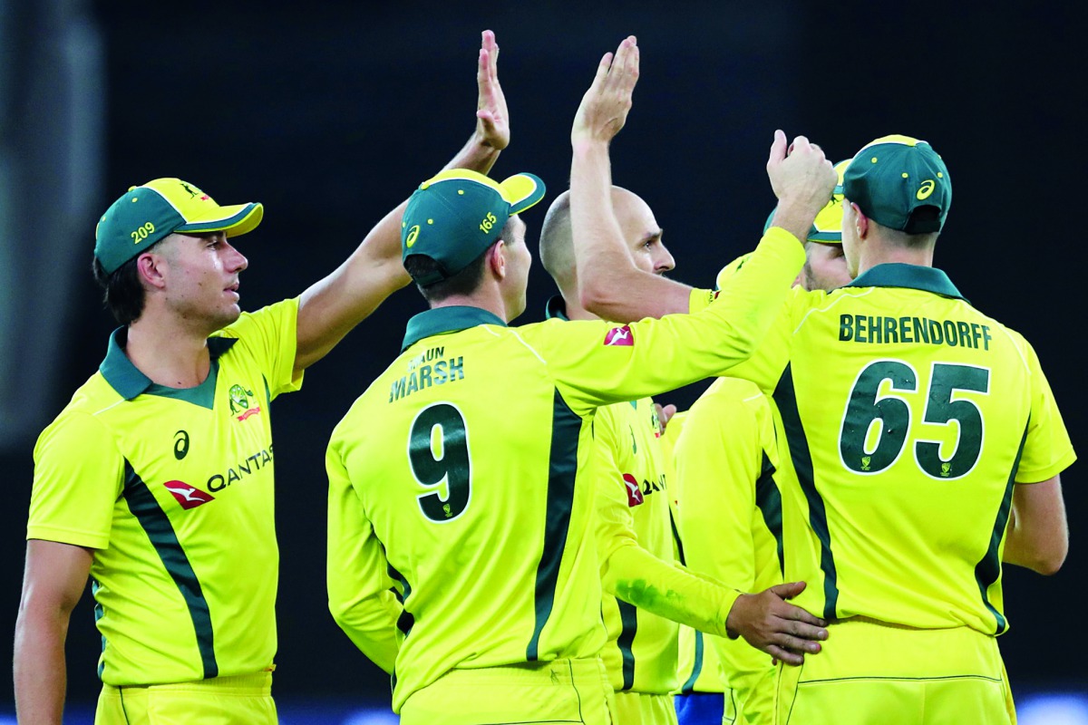 Australian cricketers Nathan Lyon celebrates the dismissal of Pakistani cricketer Umar Akmal during the fifth one-day international (ODI) cricket match between Pakistan and Australia at Dubai International Stadium on March 31, 2019. AFP / Mahmoud Khal