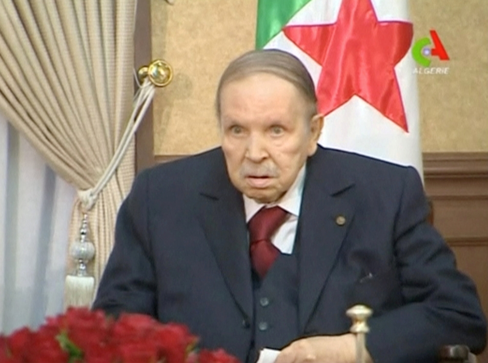Algeria's President Abdelaziz Bouteflika looks on during a meeting with army Chief of Staff Lieutenant General Gaid Salah in Algiers, Algeria, in this handout still image taken from TV. Algerian TV /Handout via Reuters 