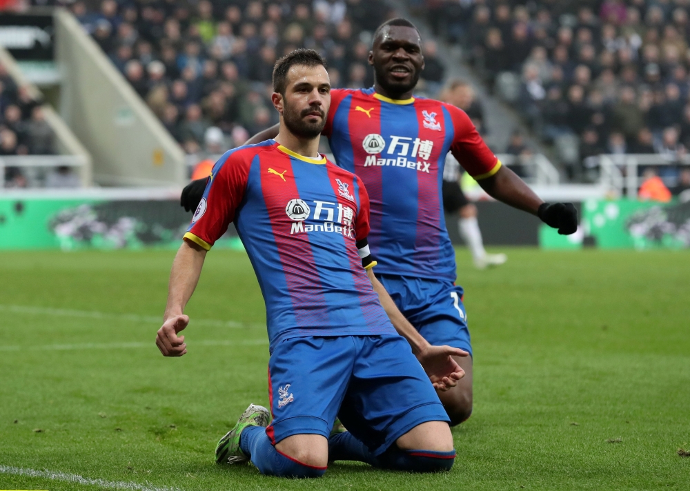 Crystal Palace's Luka Milivojevic celebrates scoring their first goal with Christian Benteke REUTERS/Scott Heppell 