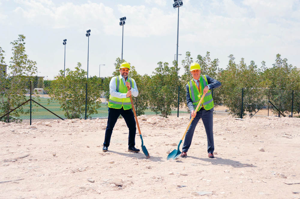 The officials of ISL Qatar at the site where the swimming pool is to be built.