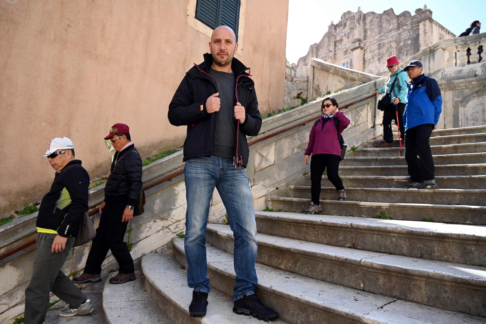 Guide Ivan Vukovic, who spends half of his time leading tours of a capital that doesn't exist -- the fictional King's Landing from 