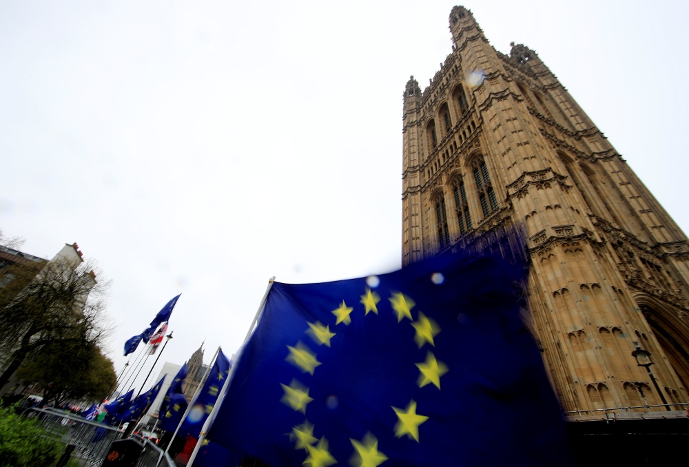 European Union flags are seen outside the Houses of Parliament, as uncertainty over Brexit continues, in London, Britain, April 9, 2019. REUTERS/Gonzalo Fuentes
 