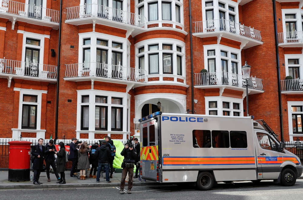 A police van is seen outside the Ecuadorian embassy after WikiLeaks founder Julian Assange was arrested by British police in London, Britain, April 11, 2019. (REUTERS/Peter Nicholls)