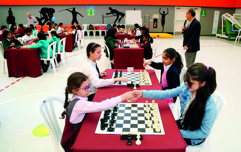 Junior players taking part in the Qatar Primary Schools Chess Tournament for girls, at the Jawaan Bin Jassim Model Independent School for Boys, yesterday.