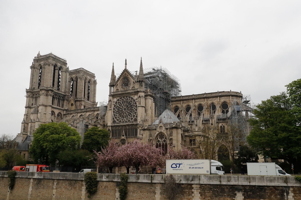 A photo shows the Notre-Dame-de Paris Cathedral a day after a fire devastated the cathedral in central Paris, on April 16, 2019.  AFP / Francois Guillot 
 