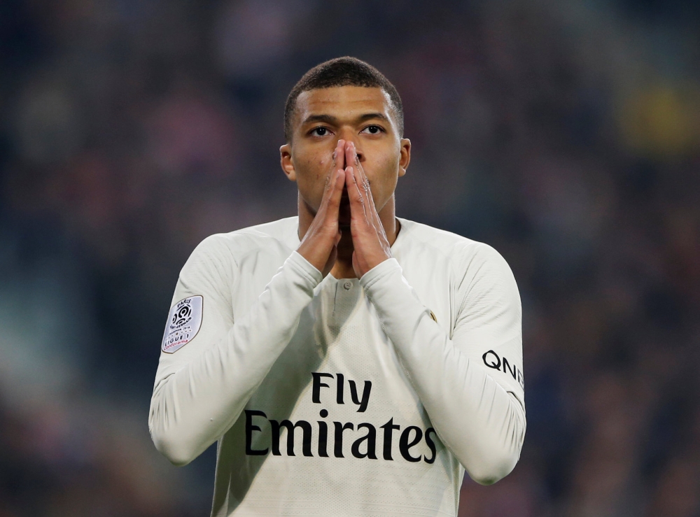 Paris St Germain's Kylian Mbappe looks dejected REUTERS/Pascal Rossignol
