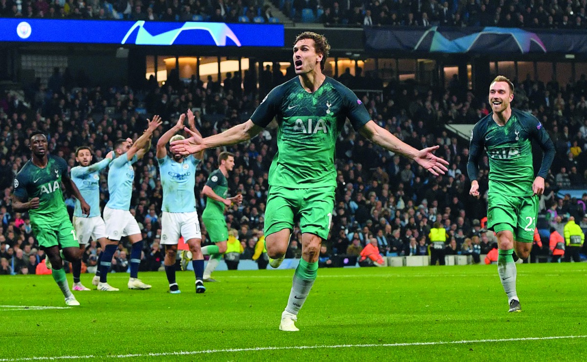 Tottenham Hotspur's Spanish striker Fernando Llorente (C) celebrates scoring his team's third goal during the UEFA Champions League quarter final second leg football match between Manchester City and Tottenham Hotspur at the Etihad Stadium in Manchester,