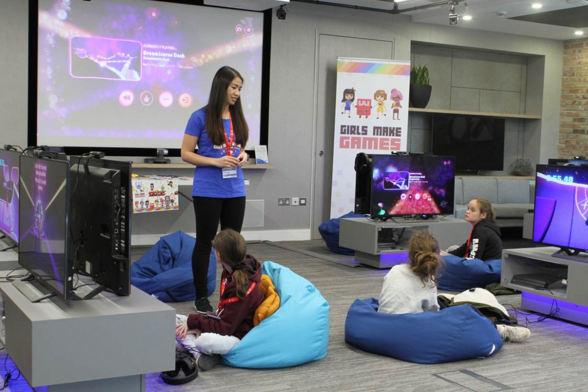 A trainer and computer programmer from Girls Make Games addresses students at an all-day workshop that teaches girls how to design and programme video games in central London, Britain, 12 April, 2019. Thomson Reuters Foundation/ Lin Taylor