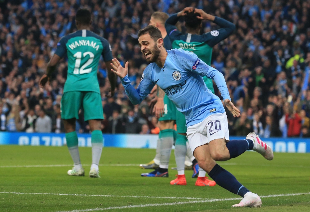 Manchester City's Portuguese midfielder Bernardo Silva celebrates scoring his team's second goal during the UEFA Champions League quarter final second leg football match between Manchester City and Tottenham Hotspur at the Etihad Stadium in Manchester, no