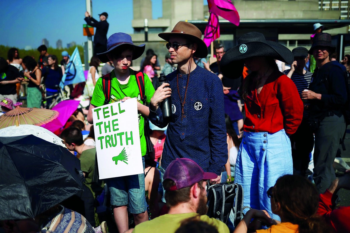 Climate change activists attend the Extinction Rebellion protest at Waterloo Bridge in London, Britain April 21, 2019. Reuters/Hannah McKay 
