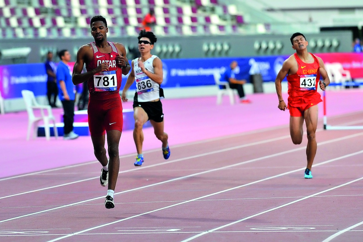 Qatari athlete Abderrahman Samba winning the 400m men’s hurdles  semi-final during 23rd Asian Athletics Championships at Khalifa International Stadium in Doha, yesterday. Pictures: Salim Matramkot /  The Peninsula