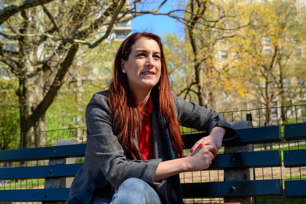 Venezuelan-American comedian, writer, and actress Joanna Hausmann speaks during an interview in Central Park on April 17, 2019 in New York. AFP / Don Emmert