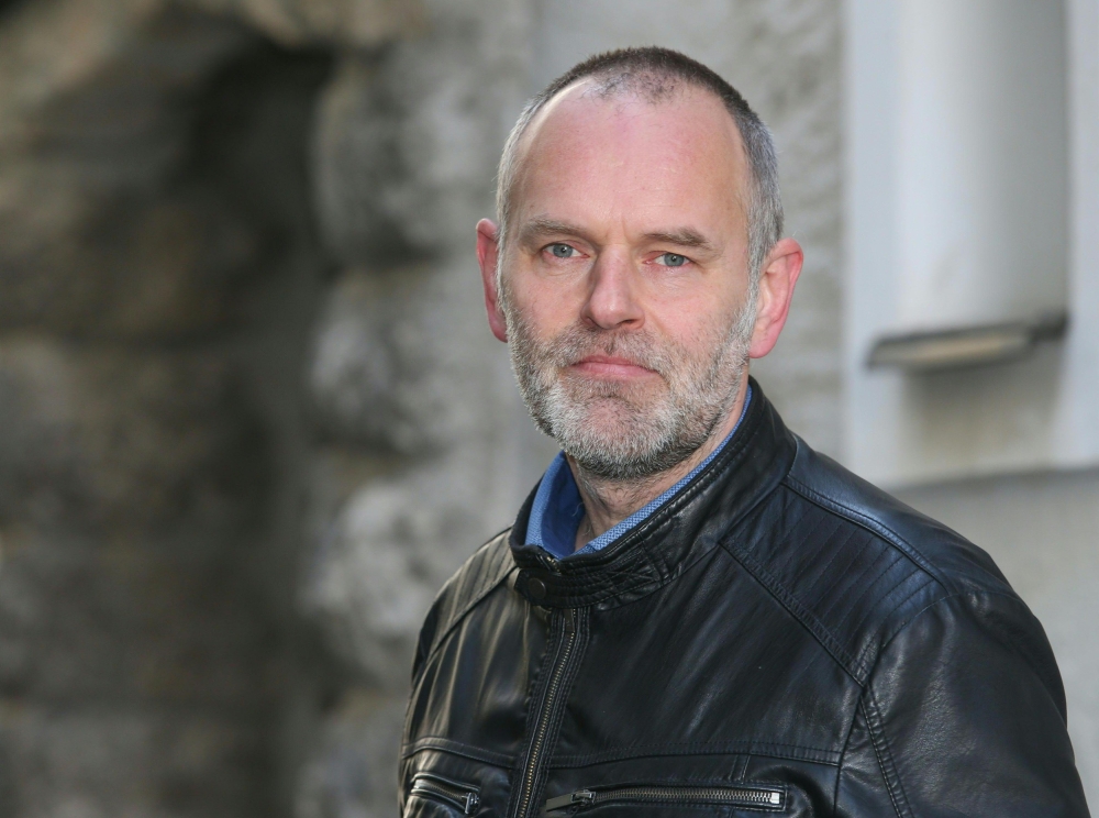 A picture taken on February 13, 2017 in Braunau am Inn, Austria, shows deputy mayor of the town and member of the local branch of the far-right Freedom Party (FPOe) Christian Schilcher posing. AFP / APA / Franz Neumayr 