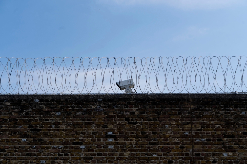 CCTV cameras are seen at Wandsworth prison in southwest London on April 12, 2019. AFP/Niklas Hallen