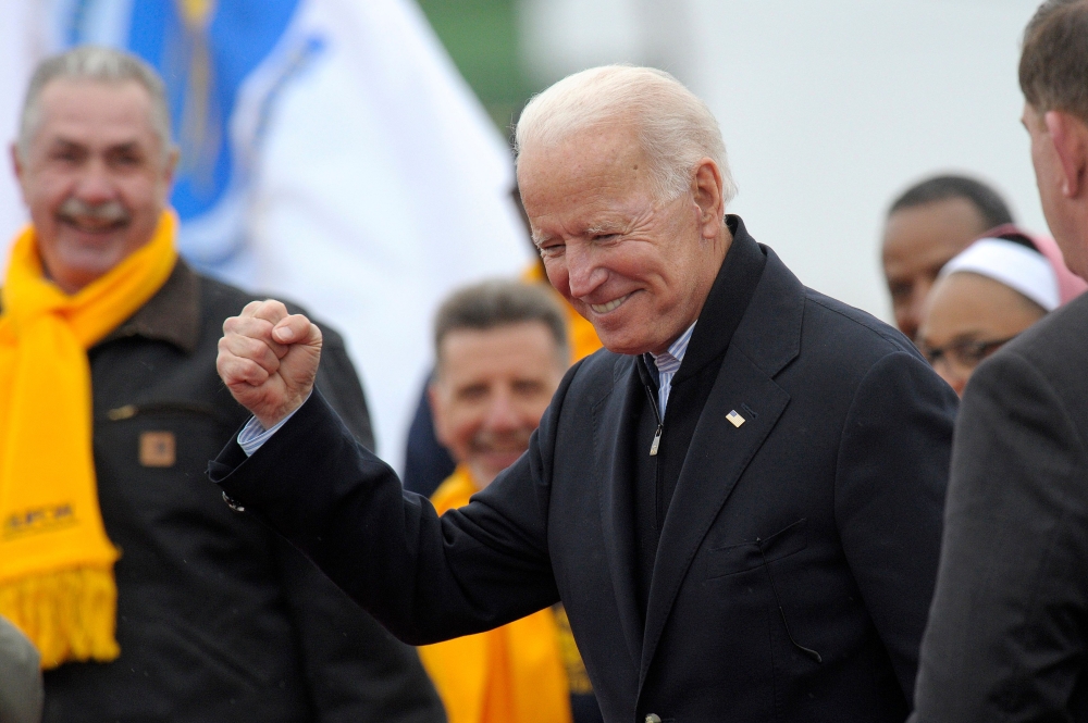  In this file photo taken on April 18, 2019 Former US vice president Joe Biden leaves a rally organized by UFCW Union members to support Stop and Shop employees on strike throughout the region at the Stop and Shop in Dorchester, Massachusetts. (AFP / JOSE