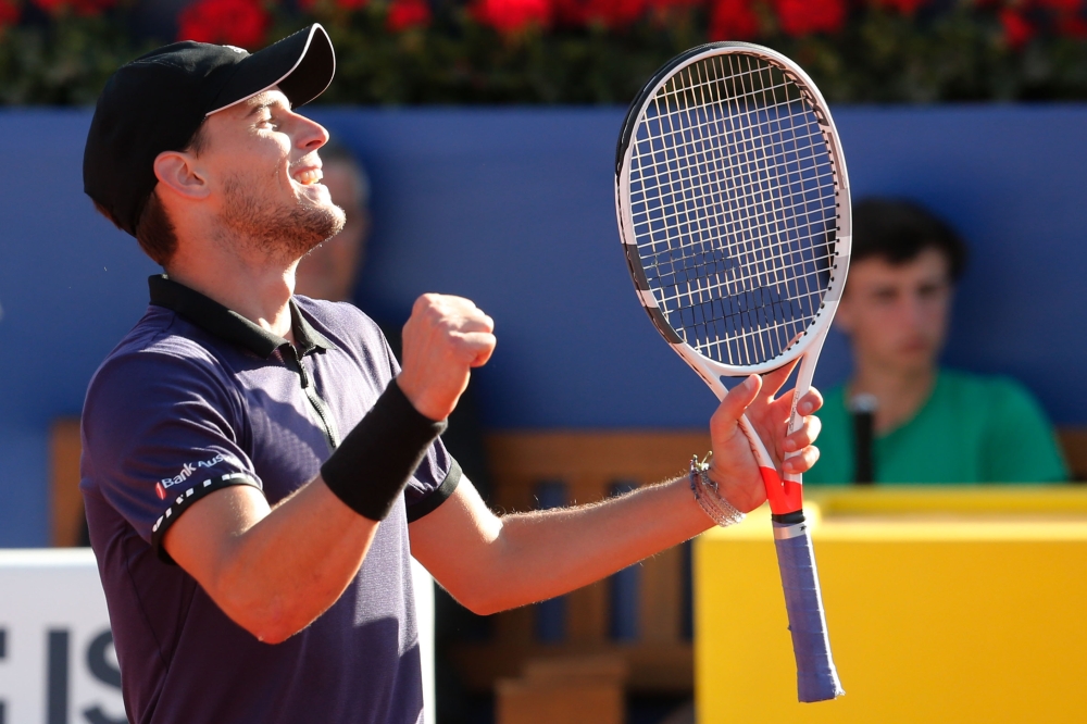 Austria's Dominic Thiem celebrates during the ATP Tour Barcelona Open semi-final tennis match against Spain's Rafael Nadal in Barcelona on April 27, 2019. / AFP / Pau Barrena