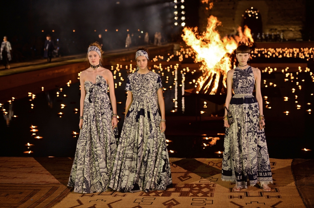 Models present creations by Christian Dior during the Croisiere 2020 collection fashion show at Badi palace in Marrakesh, on April 29, 2019. AFP 