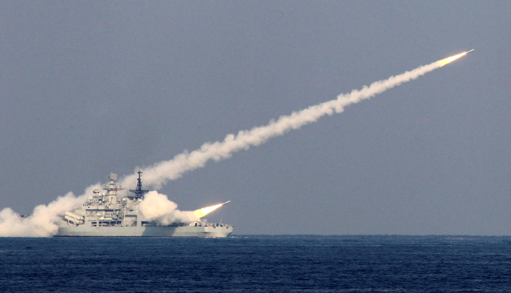 Guided missiles are launched during a drill of the North Sea Fleet in Qingdao, Shandong province, China October 17, 2013. Reuters/handout