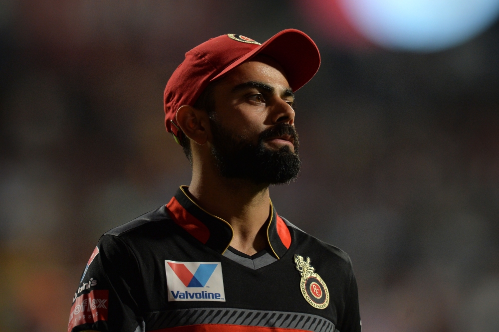 Royal Challengers Bangalore captain Virat Kohli looks on during the 2019 Indian Premier League (IPL) Twenty20 cricket match between Royal Challengers Bangalore and Rajasthan Royals at The M. Chinnaswamy Stadium in Bangalore early May 1, 2019. GETTYOUT / A