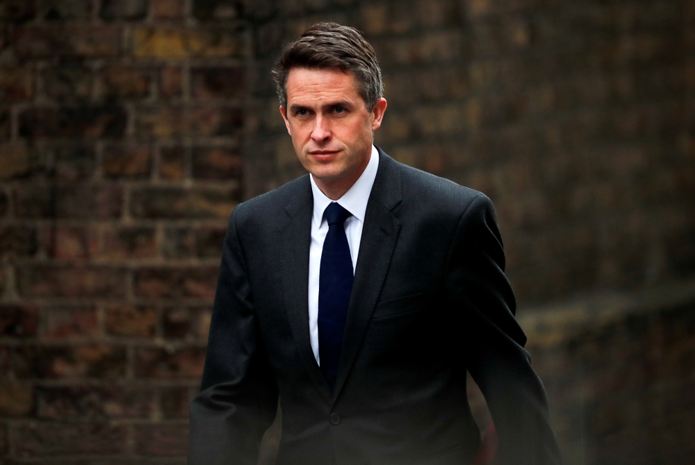 FILE PHOTO: Britain's Secretary of State for Defence Gavin Williamson is seen outside Downing Street in London, Britain, April 2, 2019. REUTERS/Alkis Konstantinidis/File Photo
