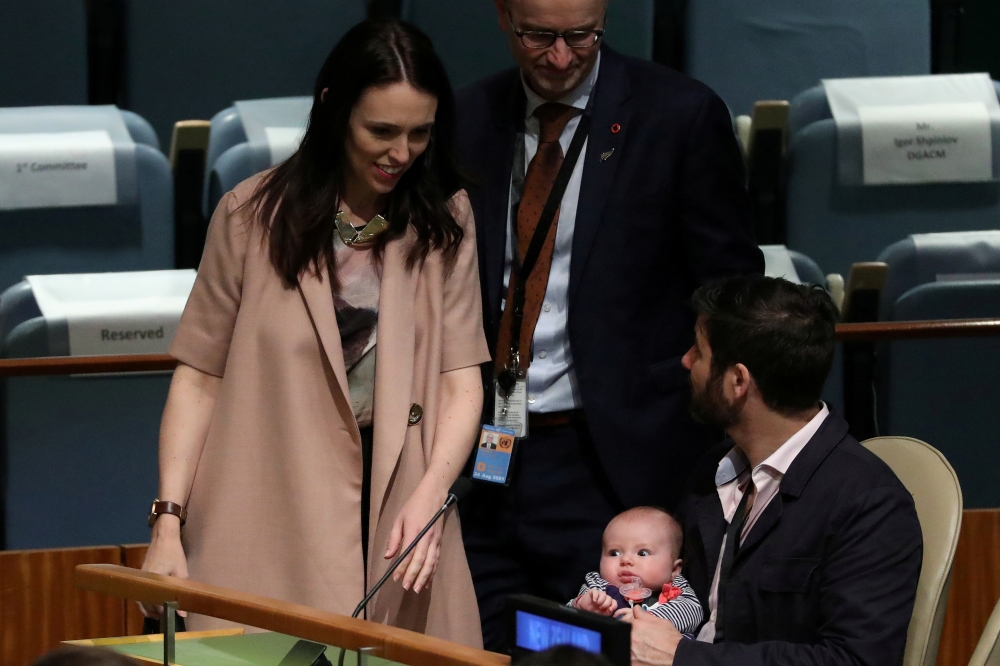 A 2018 file photo of New Zealand Prime Minister Jacinda Ardern as she walks back to her baby Neve and partner Clarke Gayford, after speaking at the Nelson Mandela Peace Summit during the 73rd UNGA in New York City, New York, US. Reuters/Carlo Allegri/File Photo