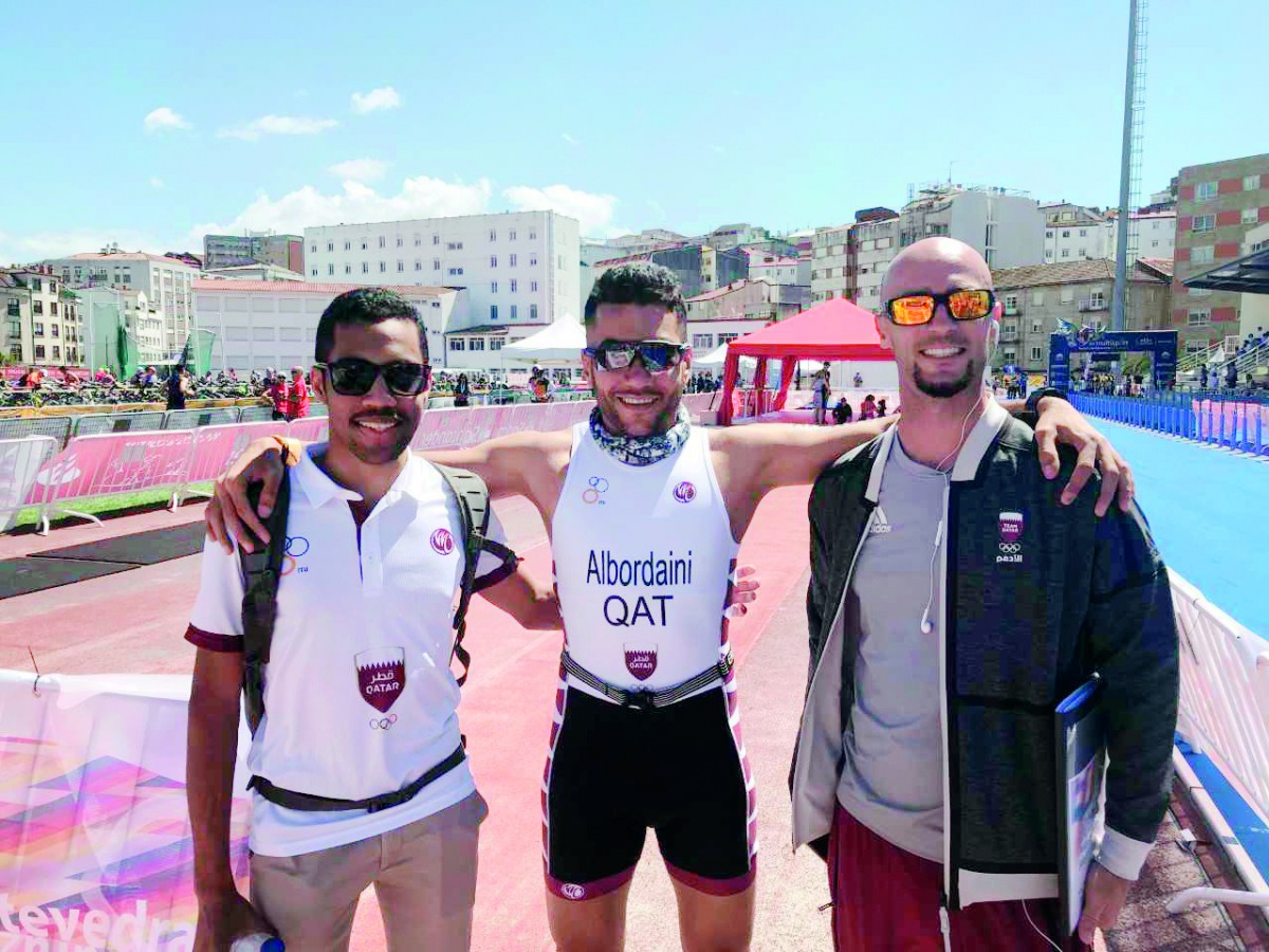 Qatari athletes Eid Al Bordani and Abdulaziz Al Ali seen along with Triathlon Federation coach Mat O’Halloran druing the ITU Multisport World Championships, in Pontevedra, Spain.
