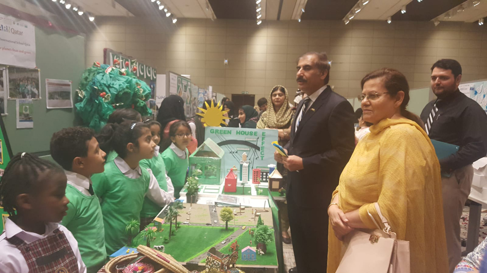 The Ambassador of Pakistan to the State of Qatar, Syed Ahsan Raza Shah, and the Principal of Pakistan International School Qatar, Nargis Raza Otho, visiting the project displayed by the students.