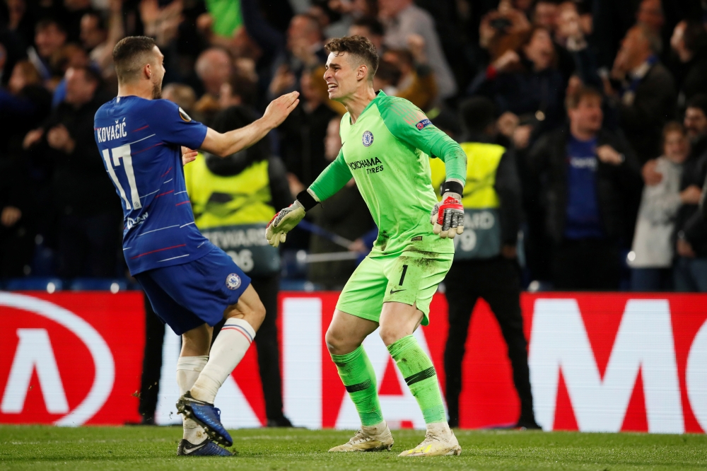 Chelsea's Mateo Kovacic and Kepa Arrizabalaga celebrate after the match REUTERS/David Klein