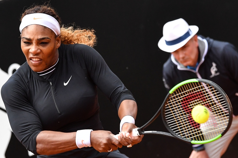 US Serena Williams hits a return to Sweden's Rebecca Peterson, during their WTA Masters tournament tennis match on May 13, 2019 at the Foro Italico in Rome. (AFP / Andreas SOLARO)