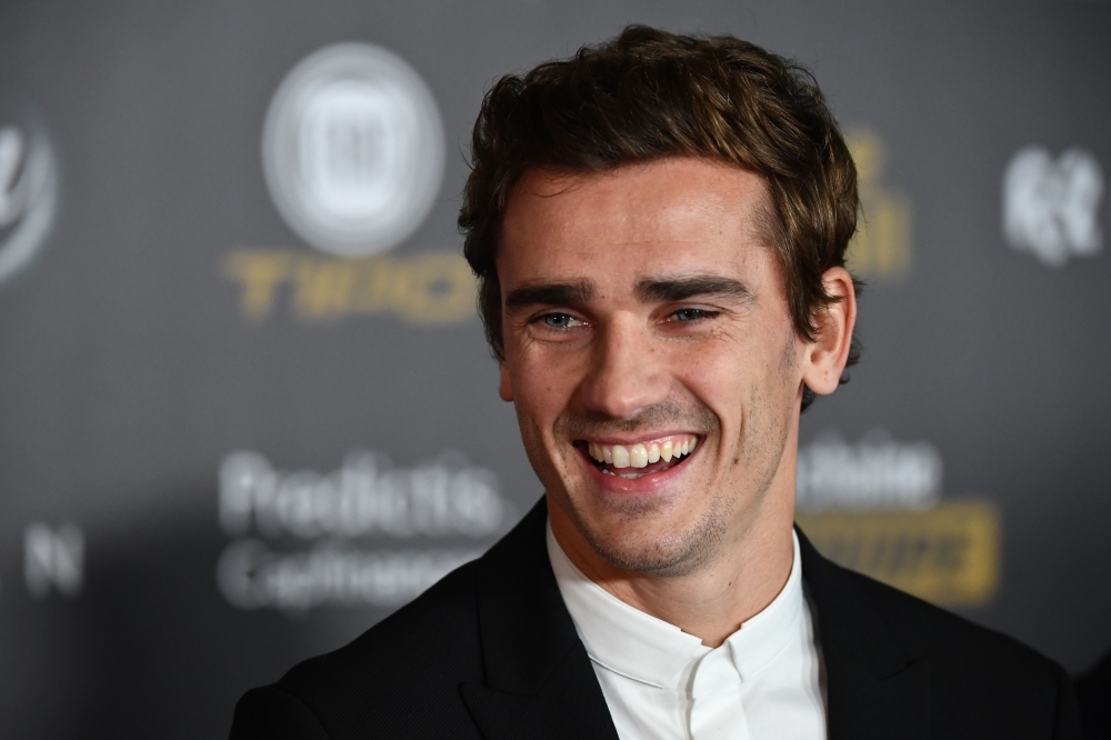 FILE PHOTO: Atletico Madrid's French forward Antoine Griezmann poses upon arrival at the 2018 Ballon d'Or award ceremony at the Grand Palais in Paris. AFP / FRANCK FIFE
