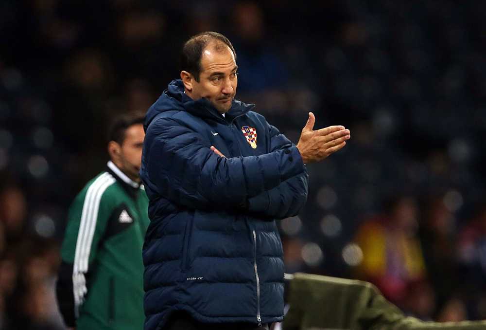 In this file photo manager of the Croatian national football team Igor Stimac gestures during the 2014 World Cup, Group A qualifying football match between Scotland and Croatia at Hampden Park in Glasgow.