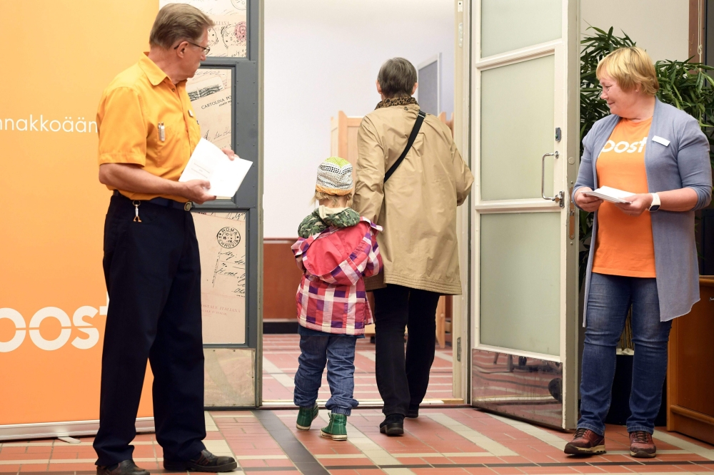 Finnish voters go to the polls during the first day of pre-voting in the European parliamentary elections in Helsinki, Finland, on May 15, 2019. Finland OUT / AFP / Lehtikuva / Heikki Saukkomaa