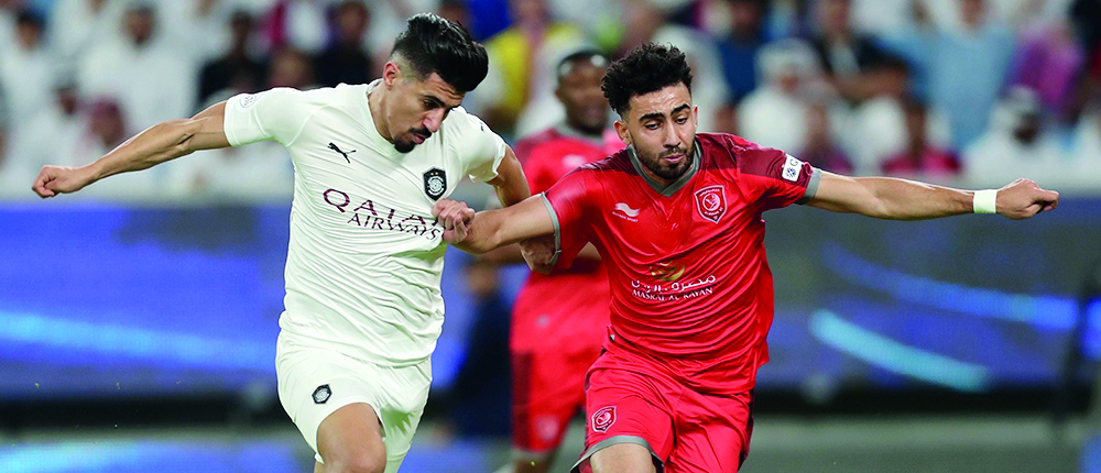 This May 16, 2019 file photo shows action during the Amir Cup final between Al Sadd and Al Duhail. 