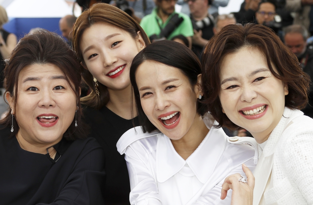 Cast members Chang Hyae-Jin, Cho Yeo-jeong, Lee Jung-Eun and Park So-Dam pose. REUTERS/Eric Gaillard