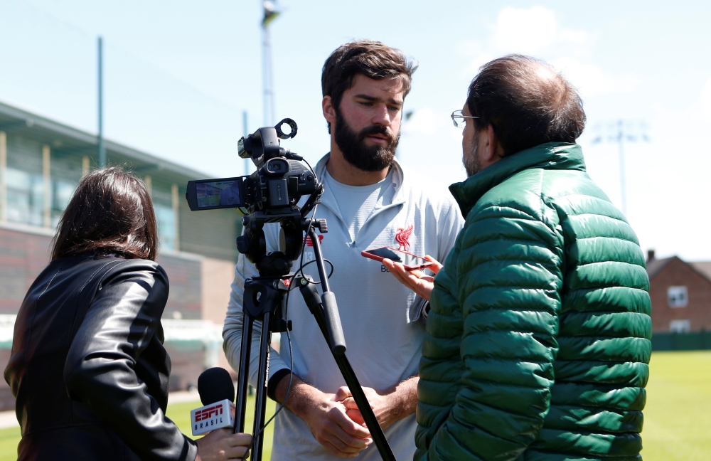 Liverpool's Alisson gives an interview Action Images via Reuters/Craig Brough