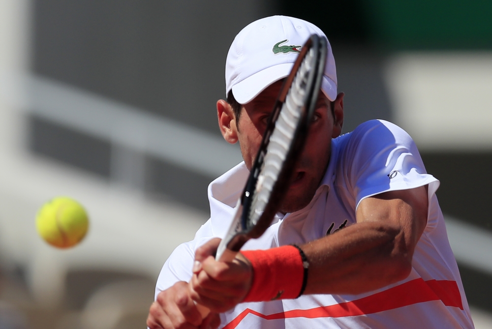 Serbia's Novak Djokovic in action during his third round match against Italy's Salvatore Caruso. REUTERS/Gonzalo Fuentes