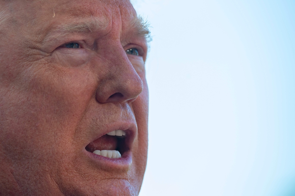 In this file photo taken on May 30, 2019 US President Donald Trump speaks with reporters as he departs the White House, in Washington, DC.  AFP / Jim Watson 
 