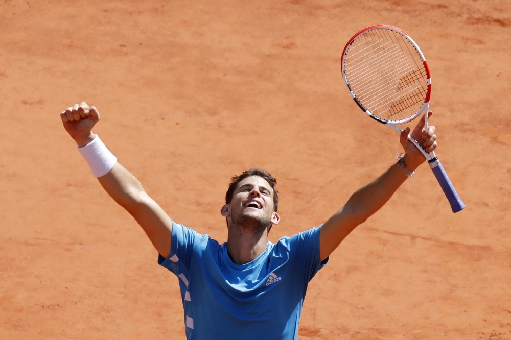 Austria's Dominic Thiem celebrates after his semifinal match against Serbia's Novak Djokovic. REUTERS/Charles Platiau