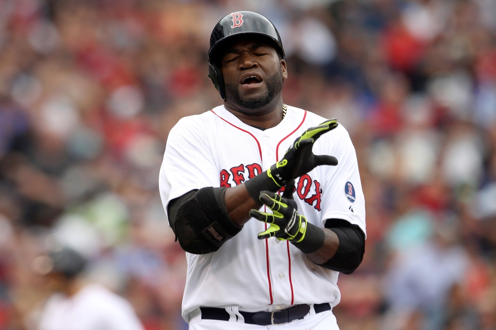 FILE PHOTO: Boston Red Sox David Ortiz reacts to lining out in the sixth inning against the New York Yankees during their MLB American League Baseball game in Boston, Massachusetts, September 14, 2013. REUTERS/Dominick Reuter/File Photo