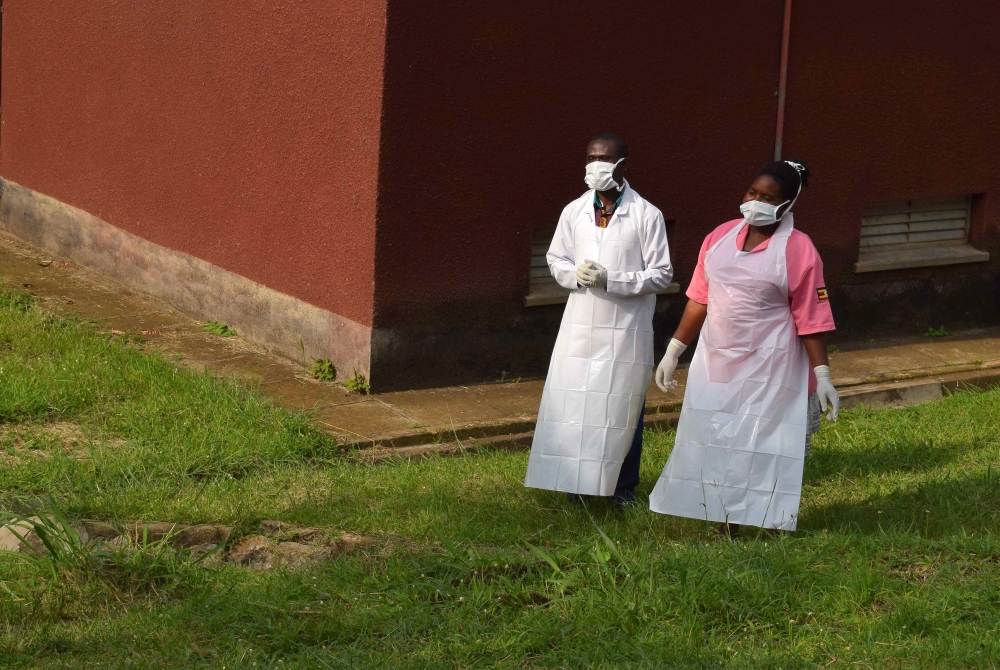 Ugandan medical staff are seen as they inspect the Ebola preparedness facilities at the Bwera general hospital near the border with the Democratic Republic of Congo in Bwera, Uganda, June 12, 2019. REUTERS/Samuel Mambo