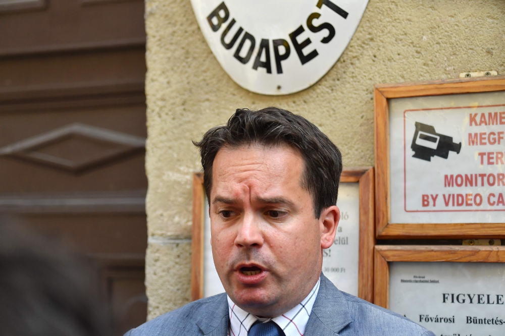 Gabor M Toth, lawyer of the captain of the Swiss Viking Sigyn cruise vessel Yuriy C (not in picture) from Ukraine, speaks with journalists in front of the building of Budapest jail on June 13, 2019 after Yuriy C was released on bail following a court orde