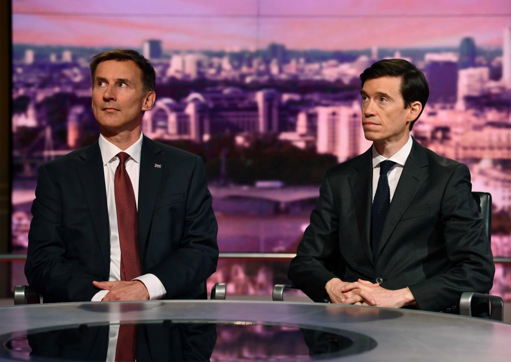 Britain's prime ministerial candidates Jeremy Hunt and Rory Stewart appear on BBC TV's The Andrew Marr Show in London, Britain June 16, 2019. Jeff Overs/BBC/Handout via REUTERS 
