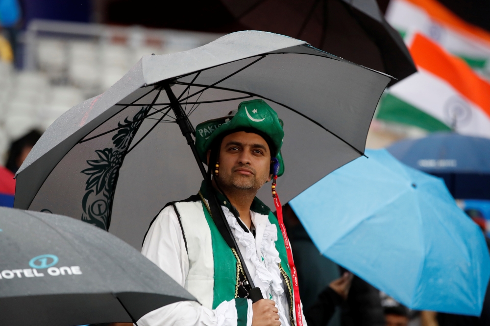 General view of a Pakistan fan as rain stops play. (Action Images via Reuters/Andrew Boyers) 