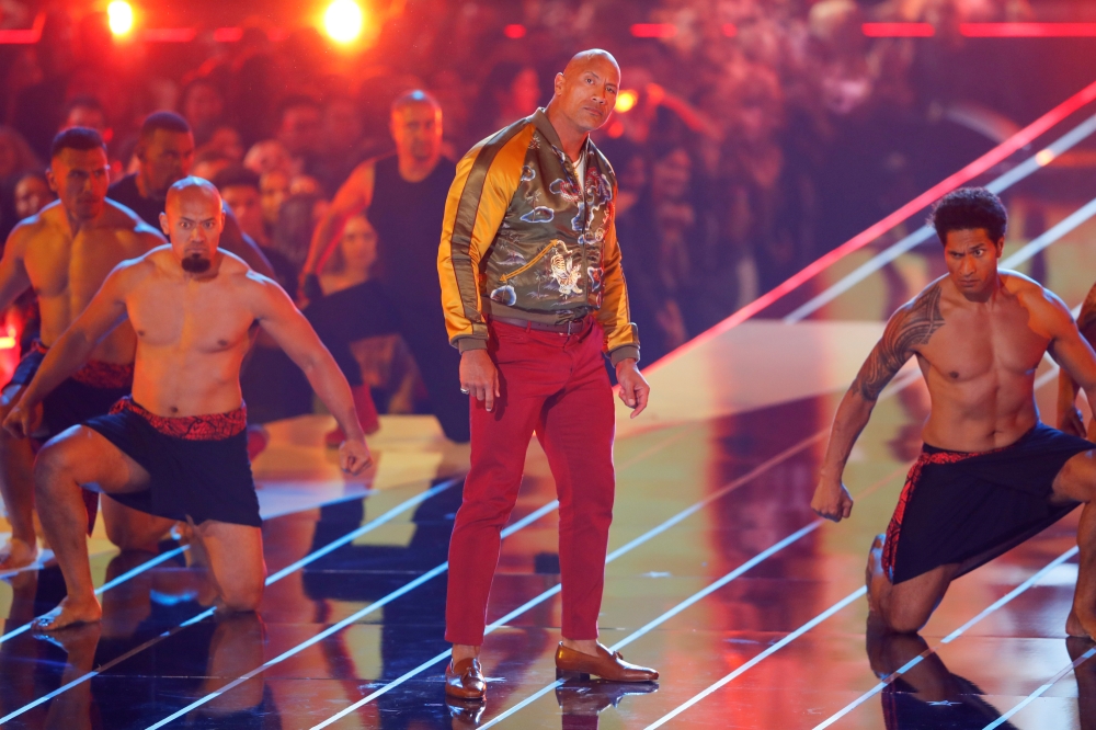 Actor Dwayne Johnson receives the Generation Award. Picture taken June 15, 2019. REUTERS/Mike Blake