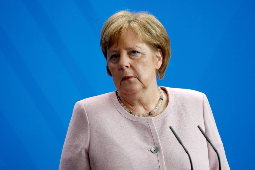 German Chancellor Angela Merkel looks on during a press conference with Ukraine's new President on his first official visit to Germany on June 18, 2019 at the Chancellery in Berlin. / AFP / Odd ANDERSEN
