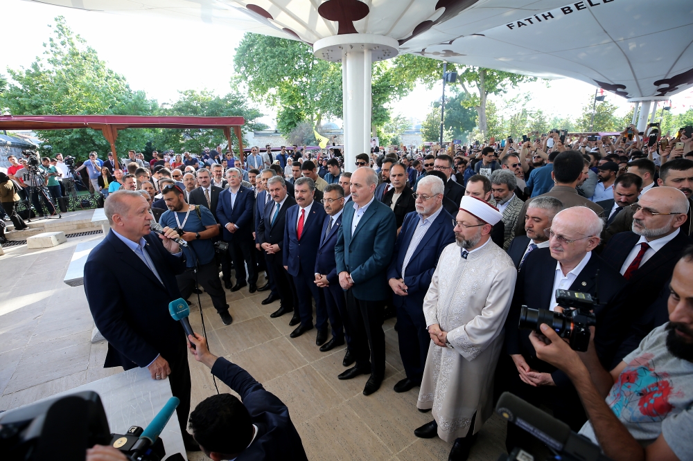 Recep Tayyip Erdogan (L) makes a speech after attending the funeral prayer in absentia for former President of Egypt Mohamed Morsi, at Fatih Mosque in Istanbul, Turkey on June 18, 2019. (?sa Terli / Anadolu Agency ) 