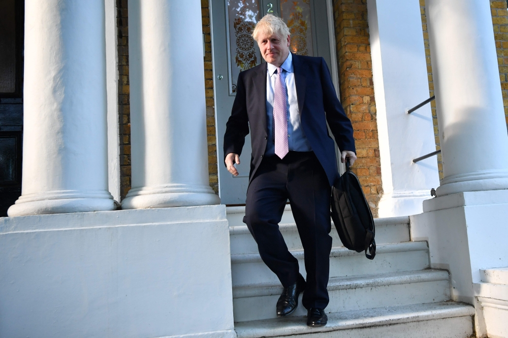 Conservative MP and Conservative leadership contender Boris Johnson leaves his home in London on June 20, 2019. (AFP / Ben STANSALL)