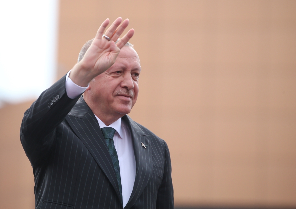 Turkish President Recep Tayyip Erdogan greets the crowd as he attends Bahcelievler mass inauguration ceremony in Istanbul, Turkey on June 20, 2019. Emrah Yorulmaz - Anadolu