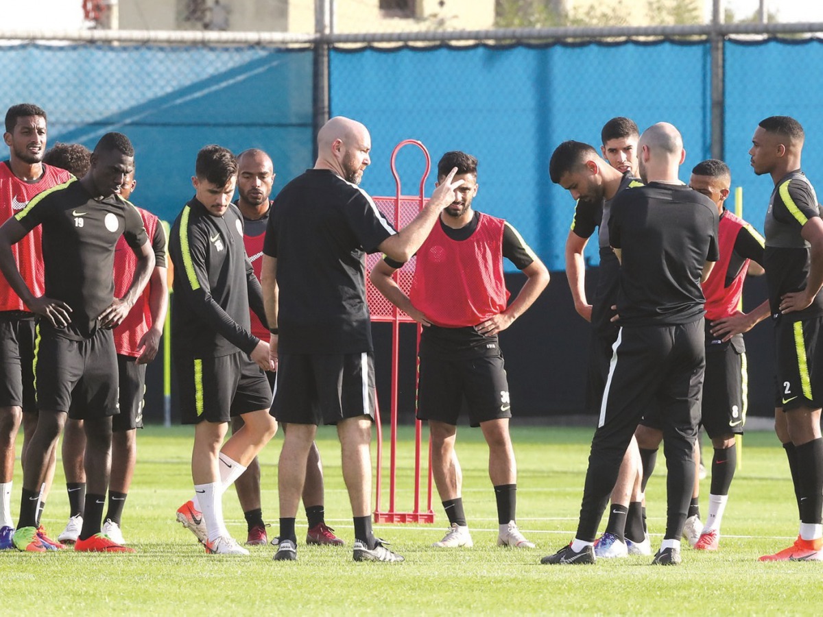Coach Felix Sanchez offers tips to Qatari players during a practice session in Porto Alegre, Brazil yesterday, on the eve of their Copa America match against Argentina.