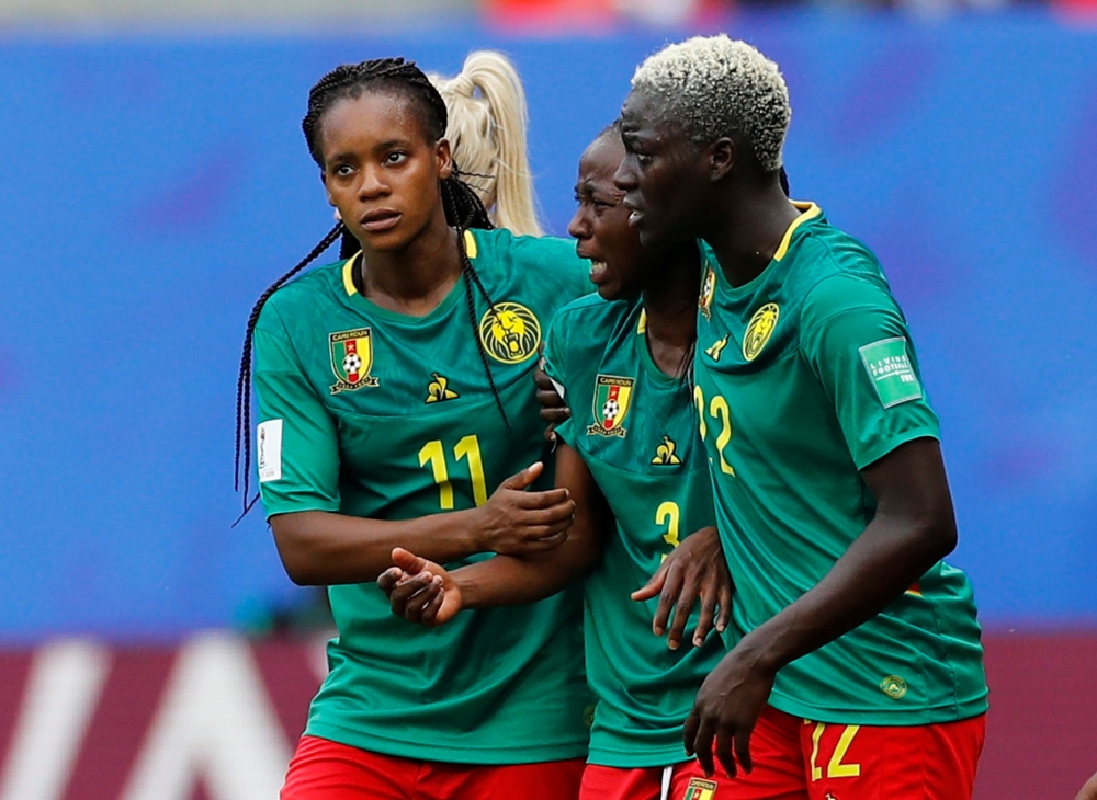 Cameroon's Ajara Nchout looks dejected after her goal is disallowed following a VAR review as Aurelle Awona and Michaela Abam console her REUTERS/Phil Noble